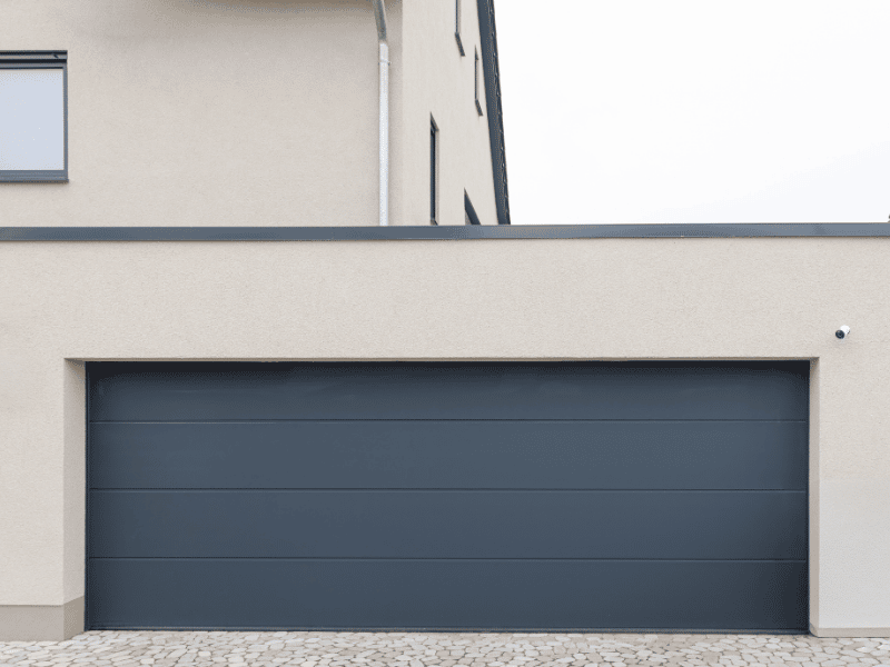 Porte de garage : comment choisir le modèle adapté à votre habitation ?